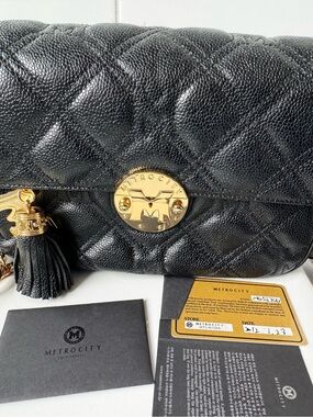 Metrocity Quilted Black Leather Shoulder Bag with Tassel